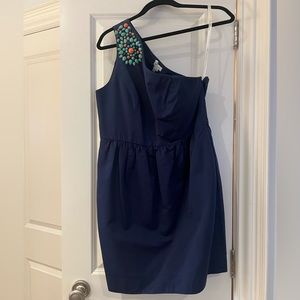 One shoulder dress with beaded detail.